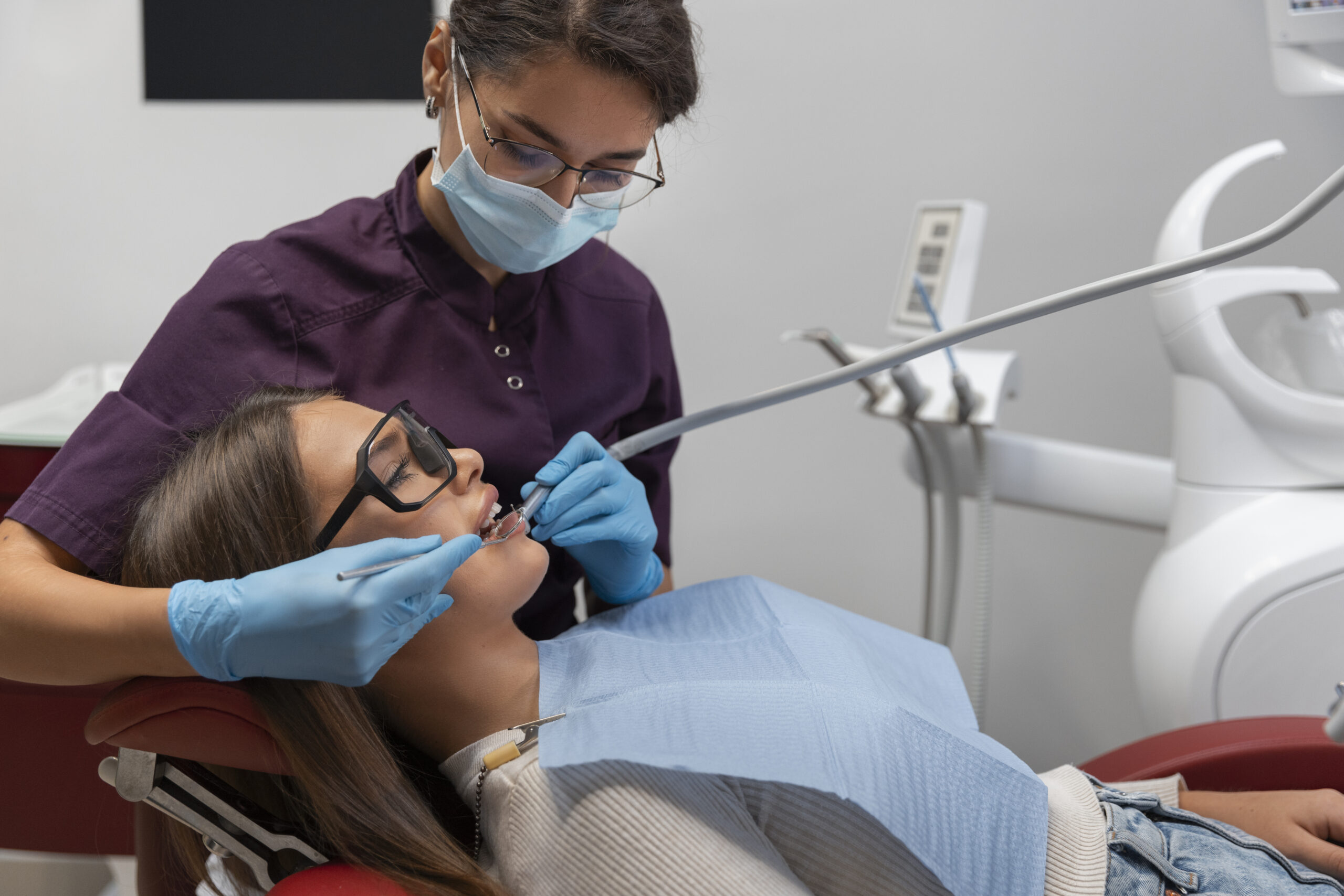 patient on dental chair after using amgraft bone graft