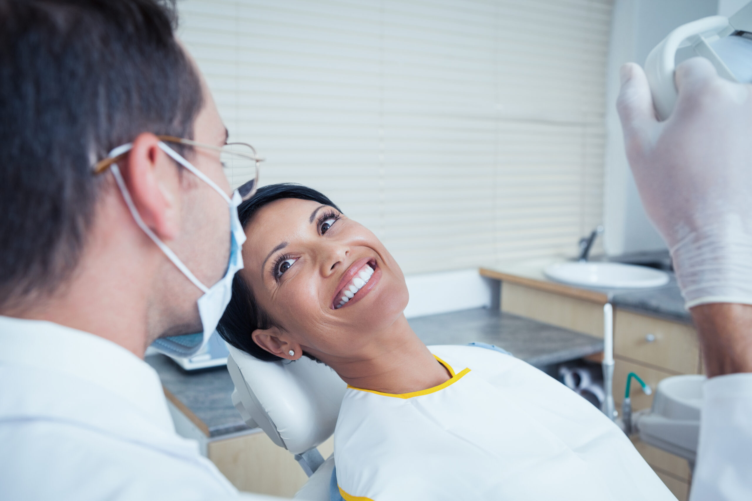 big smile patient post op 2 months after implant and amgraft bone graft